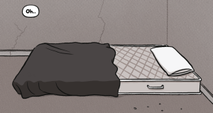 A bare mattress with a single blanket and pillow in the corner of an empty room with cracked walls.